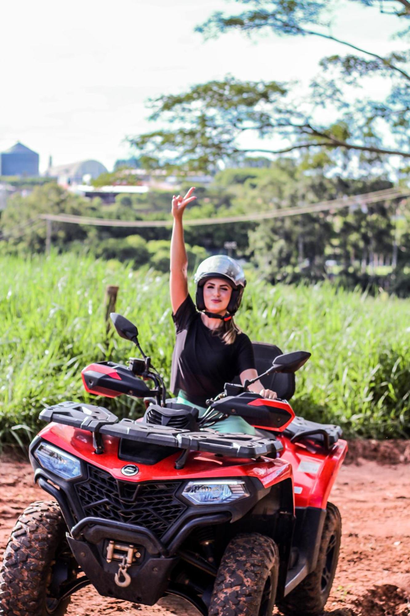 Blue Tree Thermas De Lins Resort Zewnętrze zdjęcie A woman on a quad bike